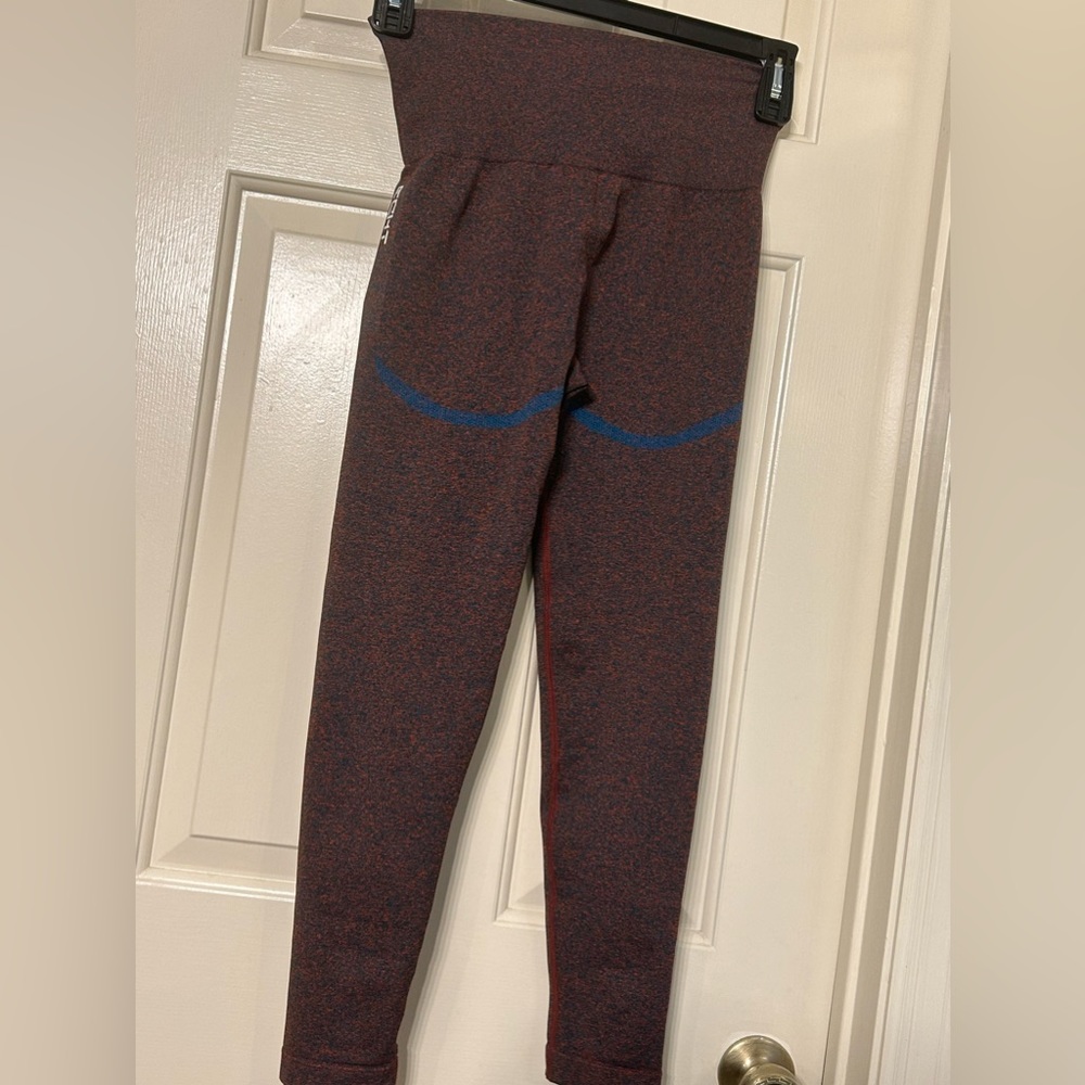 ECHT Leggings size Small burnt orange with blue
